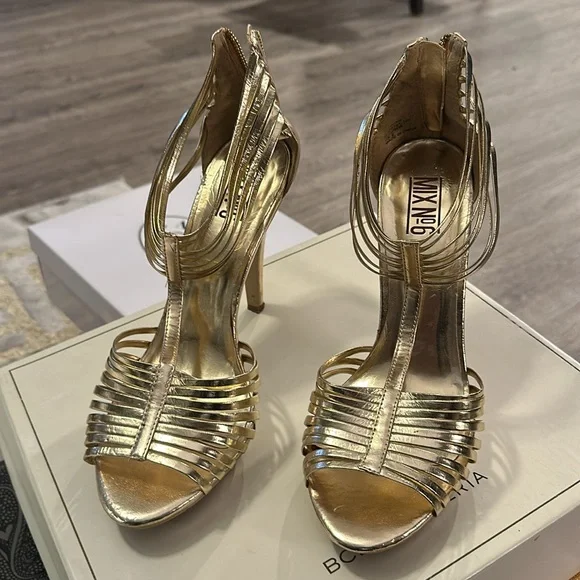 Gold strapped high heels with zippered back. - Picture 2 of 6